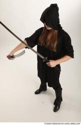 Woman Adult Average White Fighting with sword Standing poses Coat